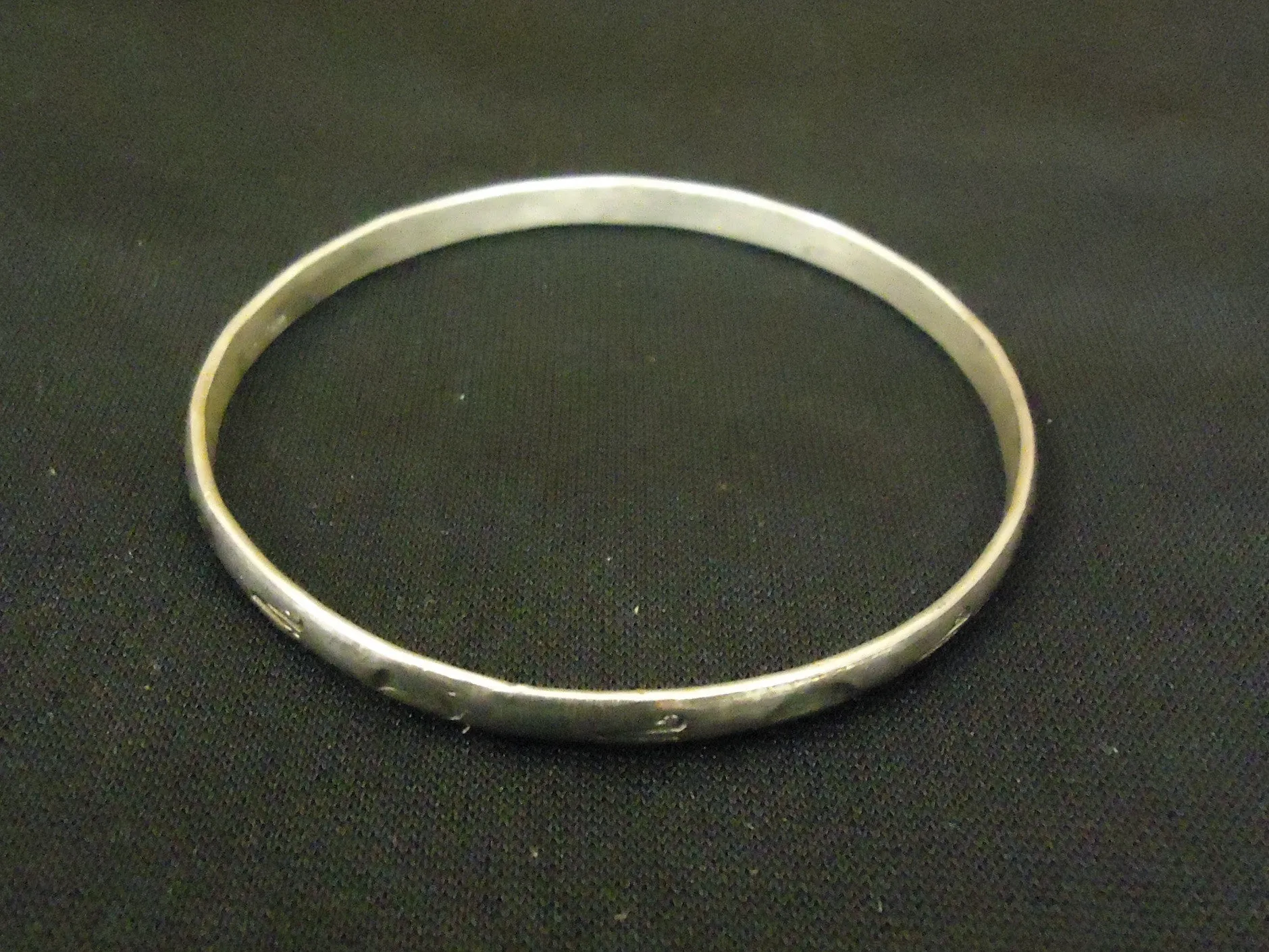 Designer Fashion Bracelet 2 1/2in x 1/8in Bangle Metal Female Adult Silvers -- Used